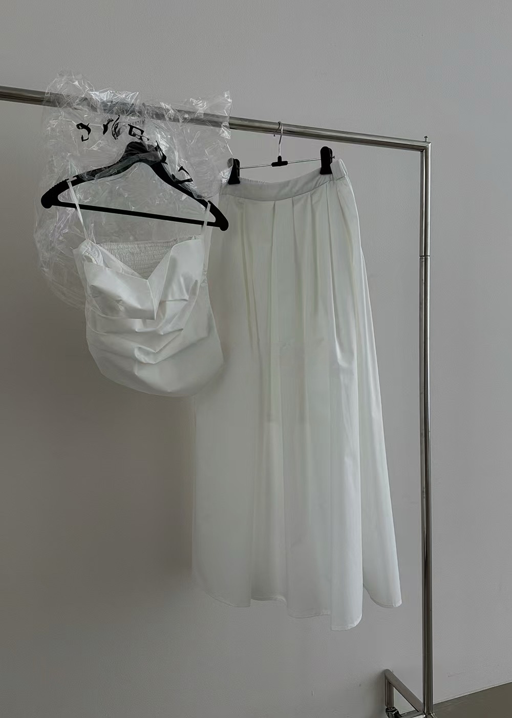 ST21506 - Designer niche asymmetrical pleated strapless top and A-line skirt set